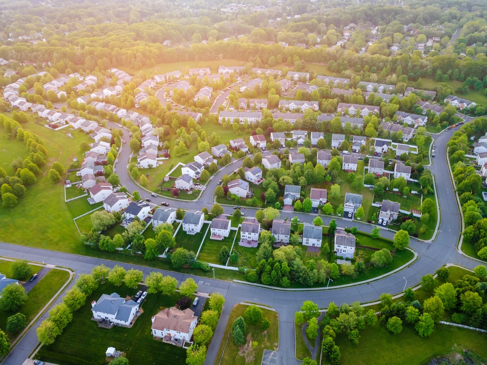 Aerial view of a neighborhood during sunset